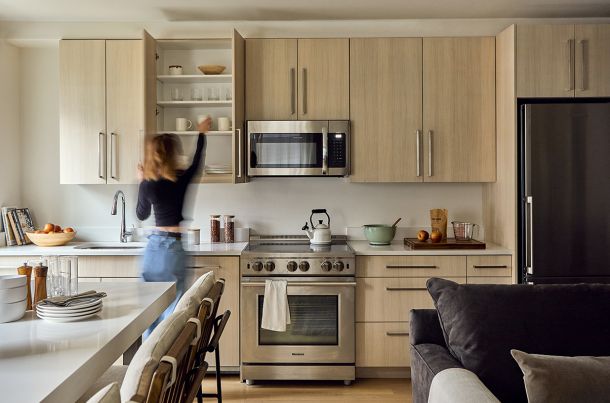 The beautiful kitchen ready for a meal at Nice Stay NYC Residence 04